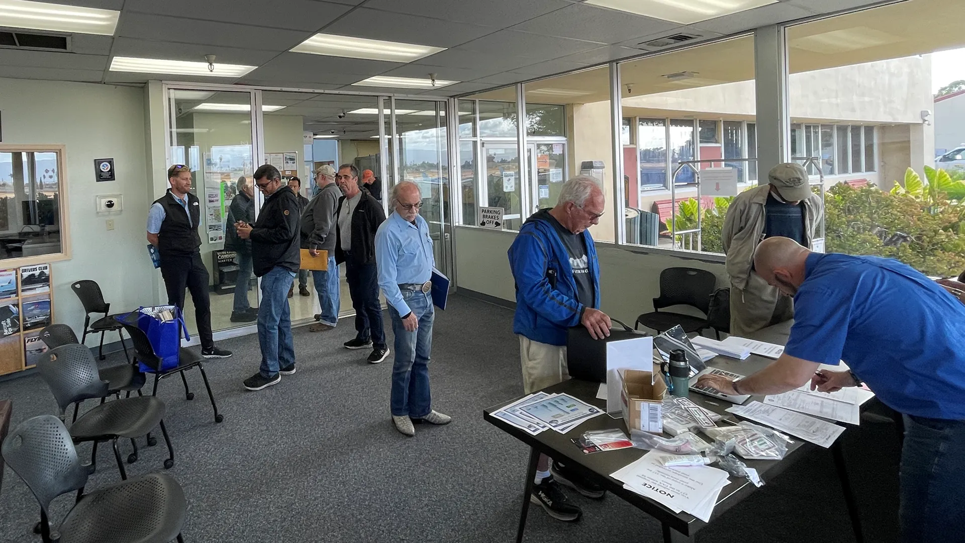 Pilots at KRHV waiting to get their STC 337 forms signed off.