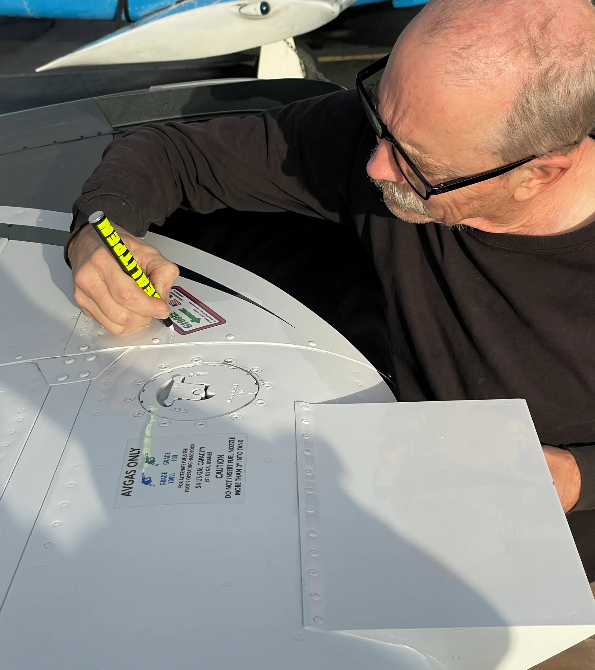 Installing the G100UL Avgas Placard on B36TC.