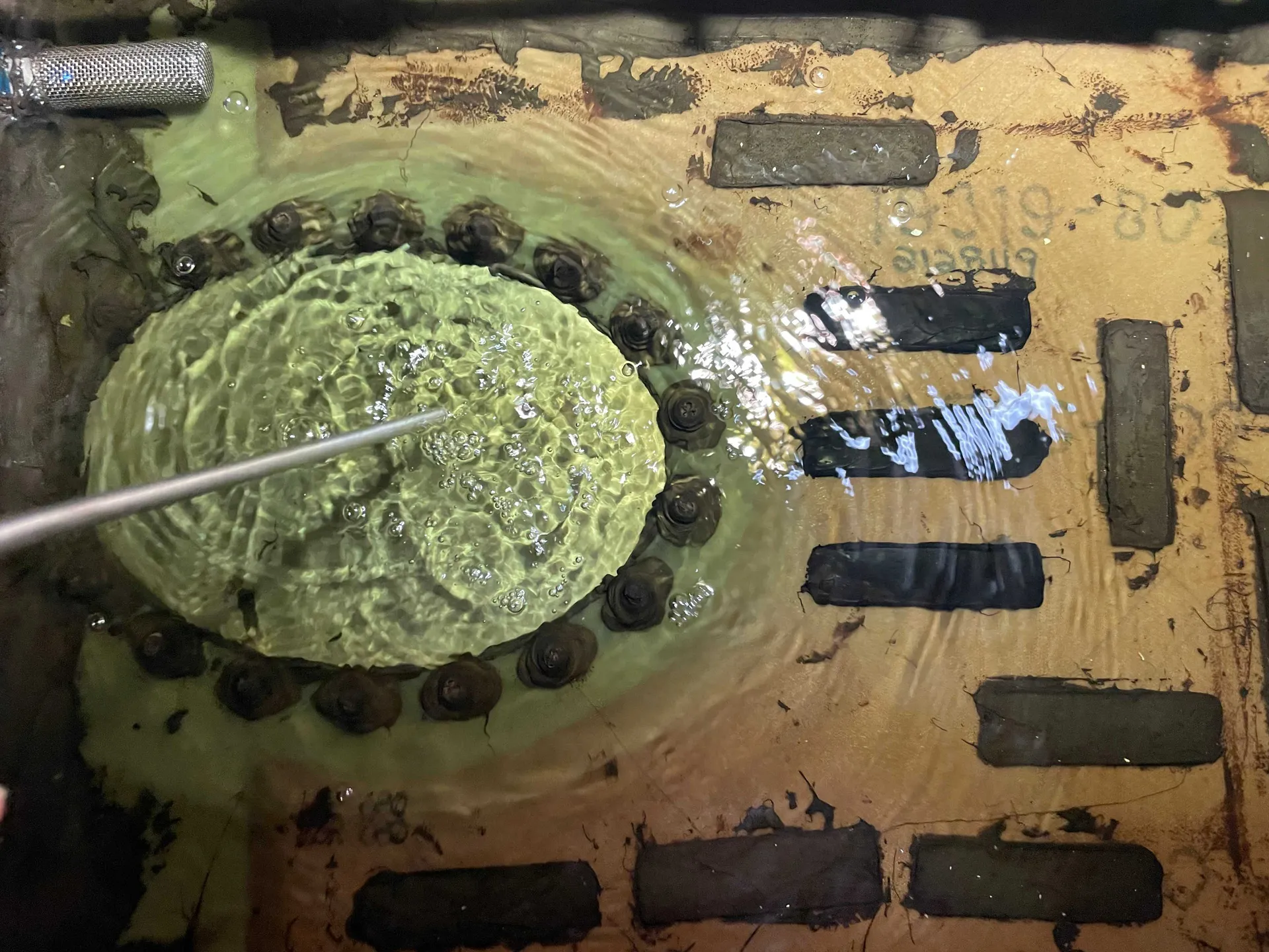 inspection of the interior of a Cirrus fuel tank establishing that original and test coupon sealant applications are still in original pristine condition after multiple rounds of G100UL fuel soak tests